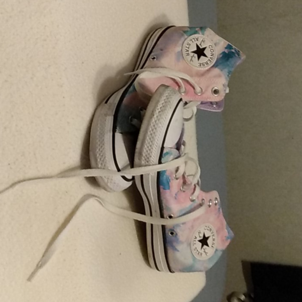 A pair of Chuck Taylor high tops.